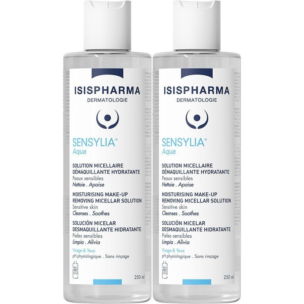 Deux flacons transparents avec bouchons blancs. Inscription: ISISPHARMA, SENSYLIA Aqua. Contient une solution nettoyante pour peaux sensibles.