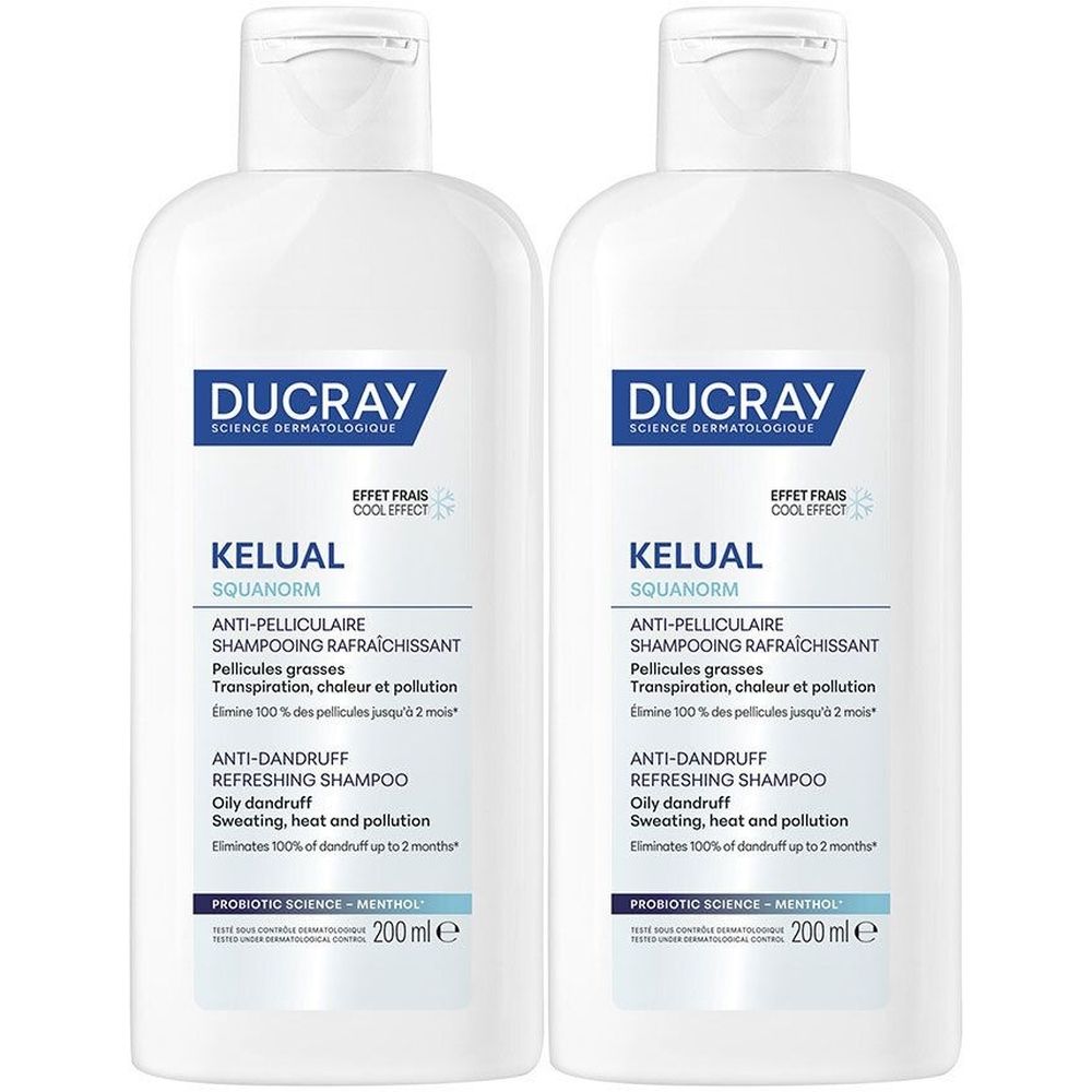 Deux flacons blancs de shampooing. Inscription : DUCRAY, KELUAL SQUANORM, shampooing antipelliculaire. 200 ml.