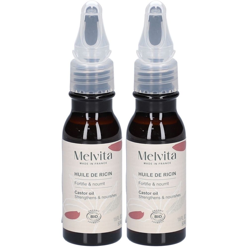 Deux flacons d'huile brune avec applicateurs transparents et étiquettes. Inscription : Melvita, Huile de Ricin, Castor Oil. Certification Bio.