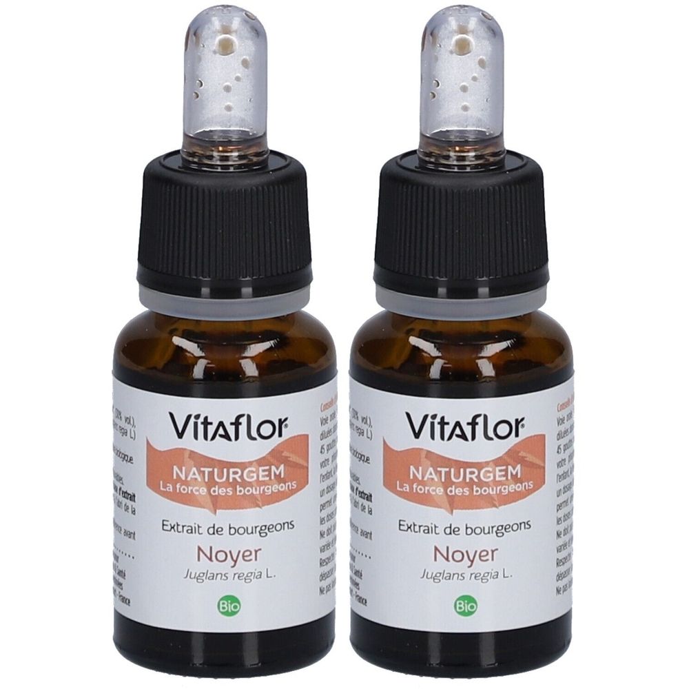 Deux flacons en verre brun avec bouchons noirs et pipettes. Étiquettes : "Vitaflor NATURGEM", extrait de bourgeons de Noyer.