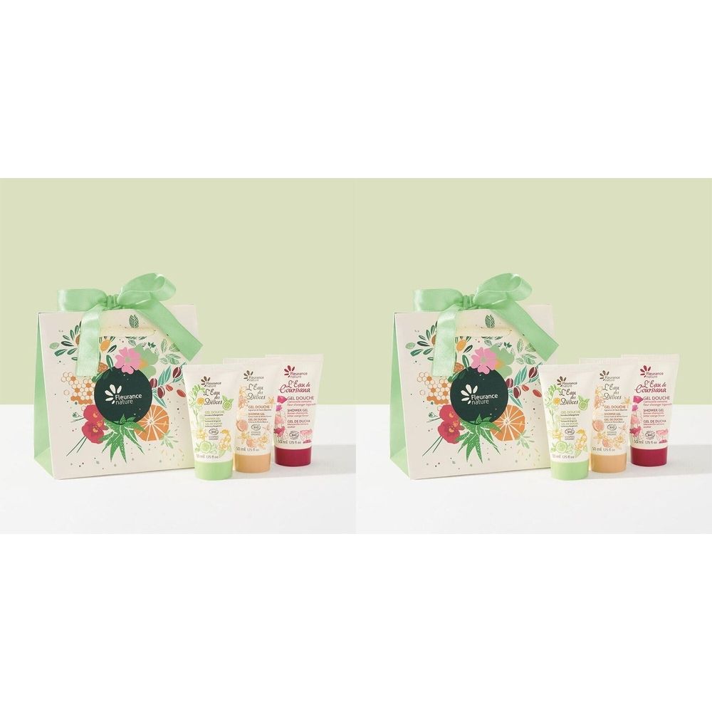 Coffret cadeau avec trois tubes de gel douche et un sac en papier avec un nœud. Les tubes sont verts, jaunes et rouges.