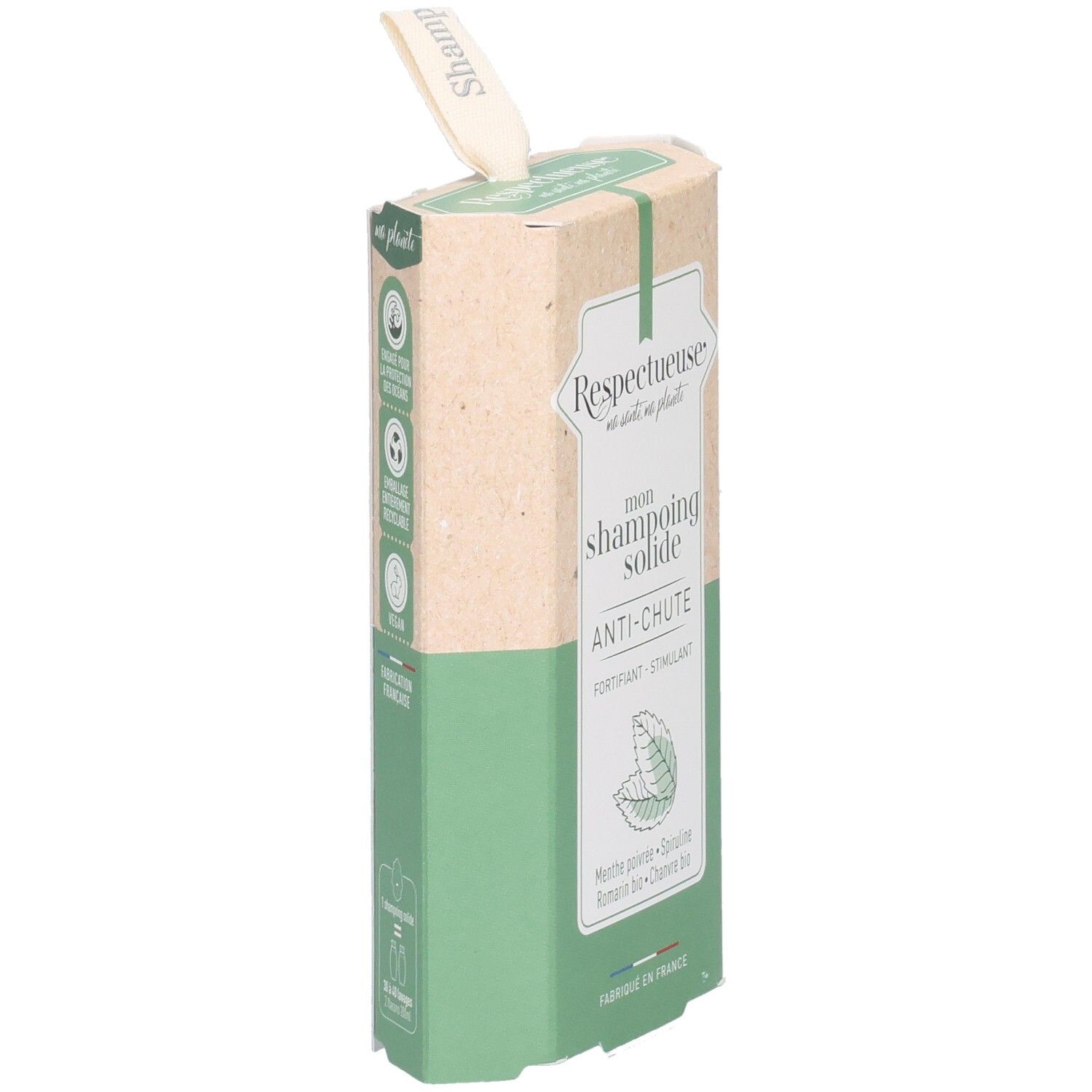 Emballage cartonné en biais. Inscription: RESPECTUEUSE, mon shampoing solide ANTI-CHUTE. Combinaison de couleurs vert et beige. Avec attache.
