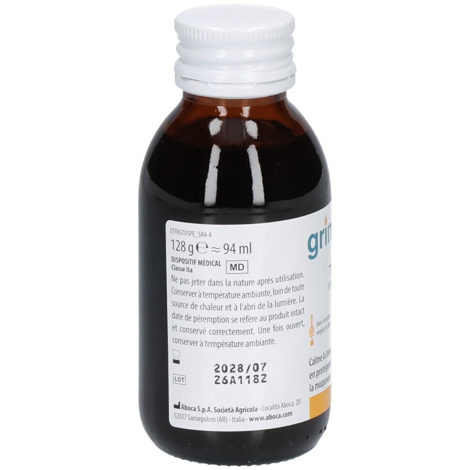 Bouteille en verre brun avec bouchon à vis blanc, remplie de sirop foncé. Étiquette avec informations produit et date de péremption.