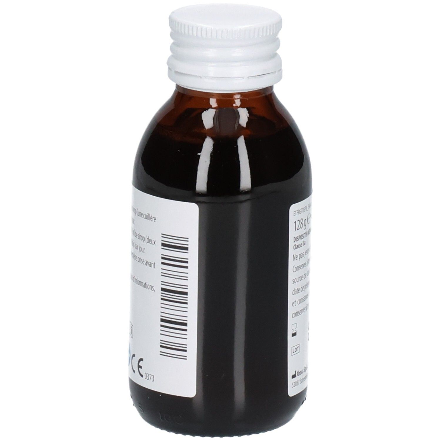 Arrière d'une bouteille en verre brun avec sirop foncé. Étiquette avec code-barres et marquage CE.