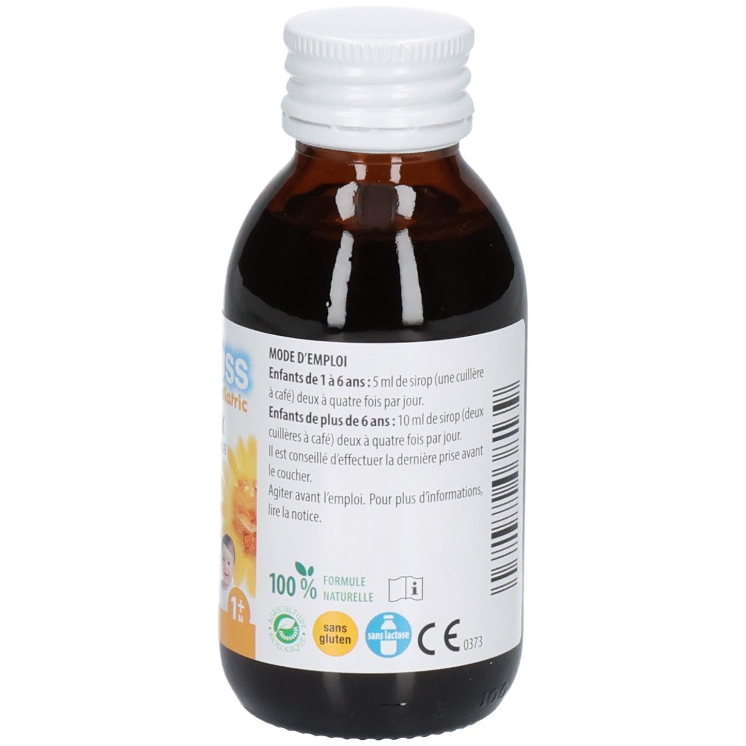 Côté d'une bouteille de sirop foncé. Étiquette avec instructions d'utilisation, sceau "100% formule naturelle" et "sans gluten".