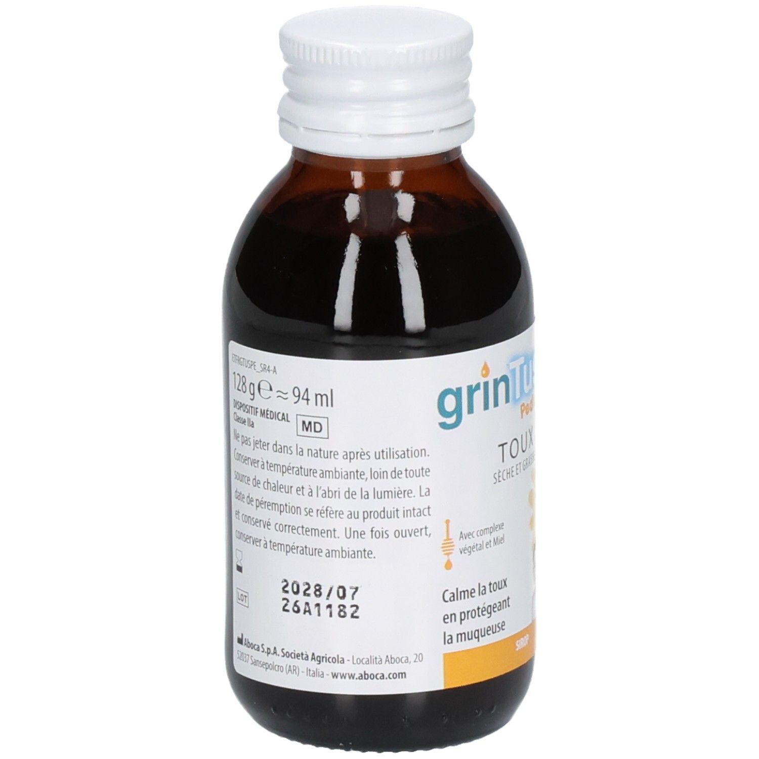Arrière d'une bouteille en verre brun avec sirop foncé. Étiquette avec informations produit, numéro de lot et date de péremption.