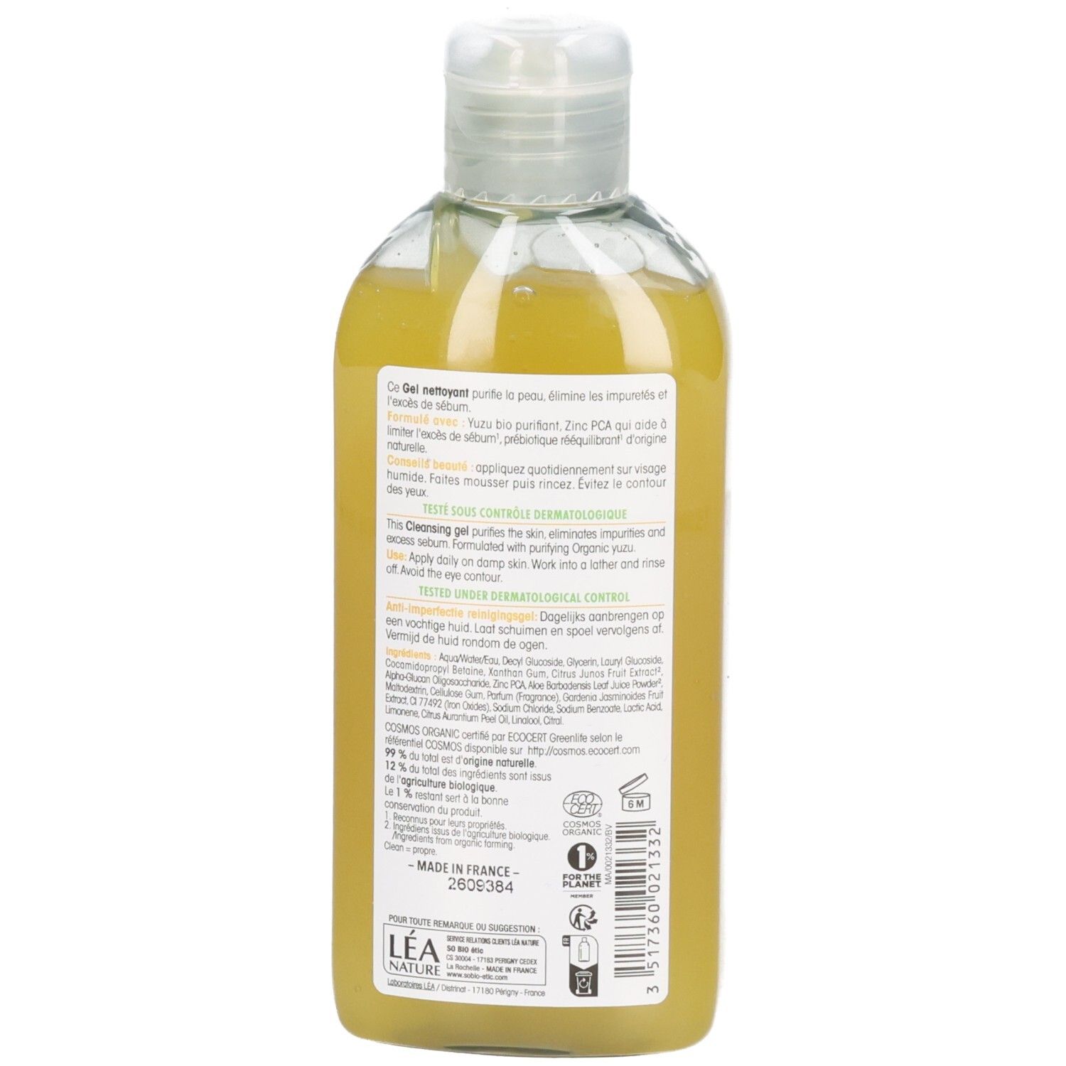 Dos du flacon avec informations produit et ingrédients. Texte multilingue.