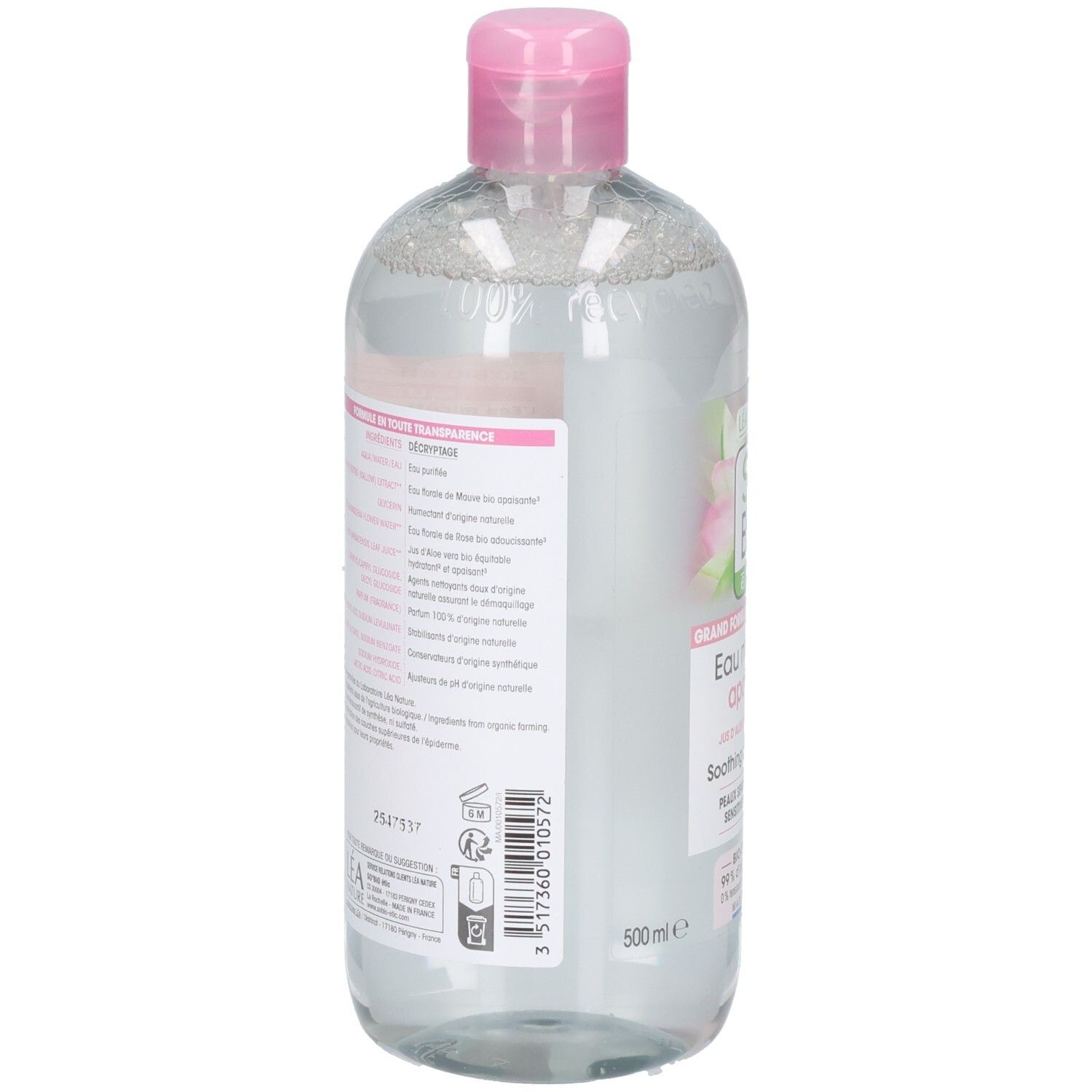 Dos du flacon. Étiquette avec texte et code-barres. Nom et logo du produit partiellement visibles.