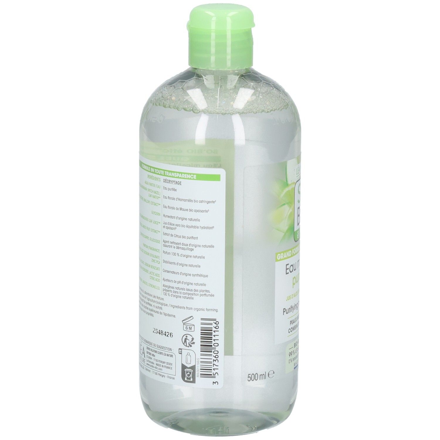 Vue arrière du flacon. Étiquette avec ingrédients et informations. Texte vert et blanc sur fond transparent.