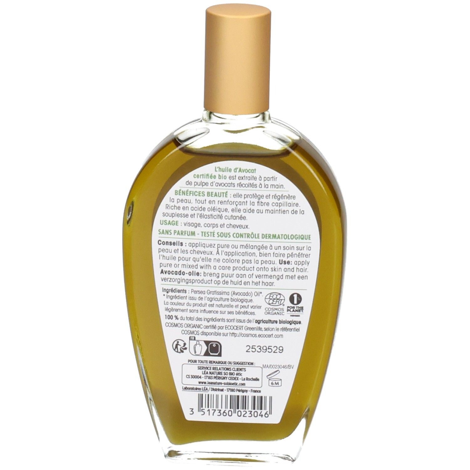 Dos du flacon en verre. Étiquette avec texte, ingrédients et label bio. Liquide de couleur jaune.