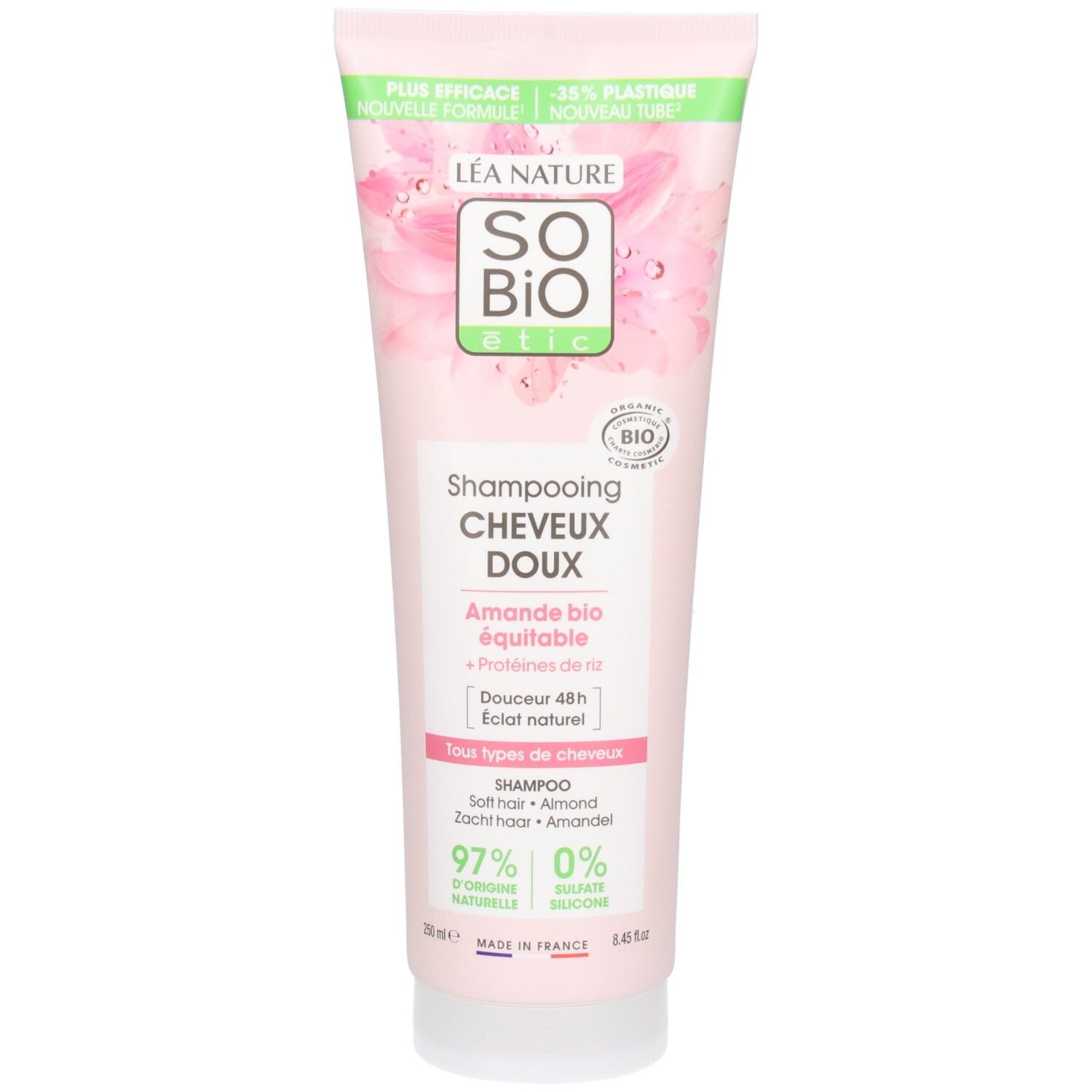Tube rose "SO BIO" avec "Shampooing Cheveux Doux". Bandes vertes et blanches en haut. Certification bio.