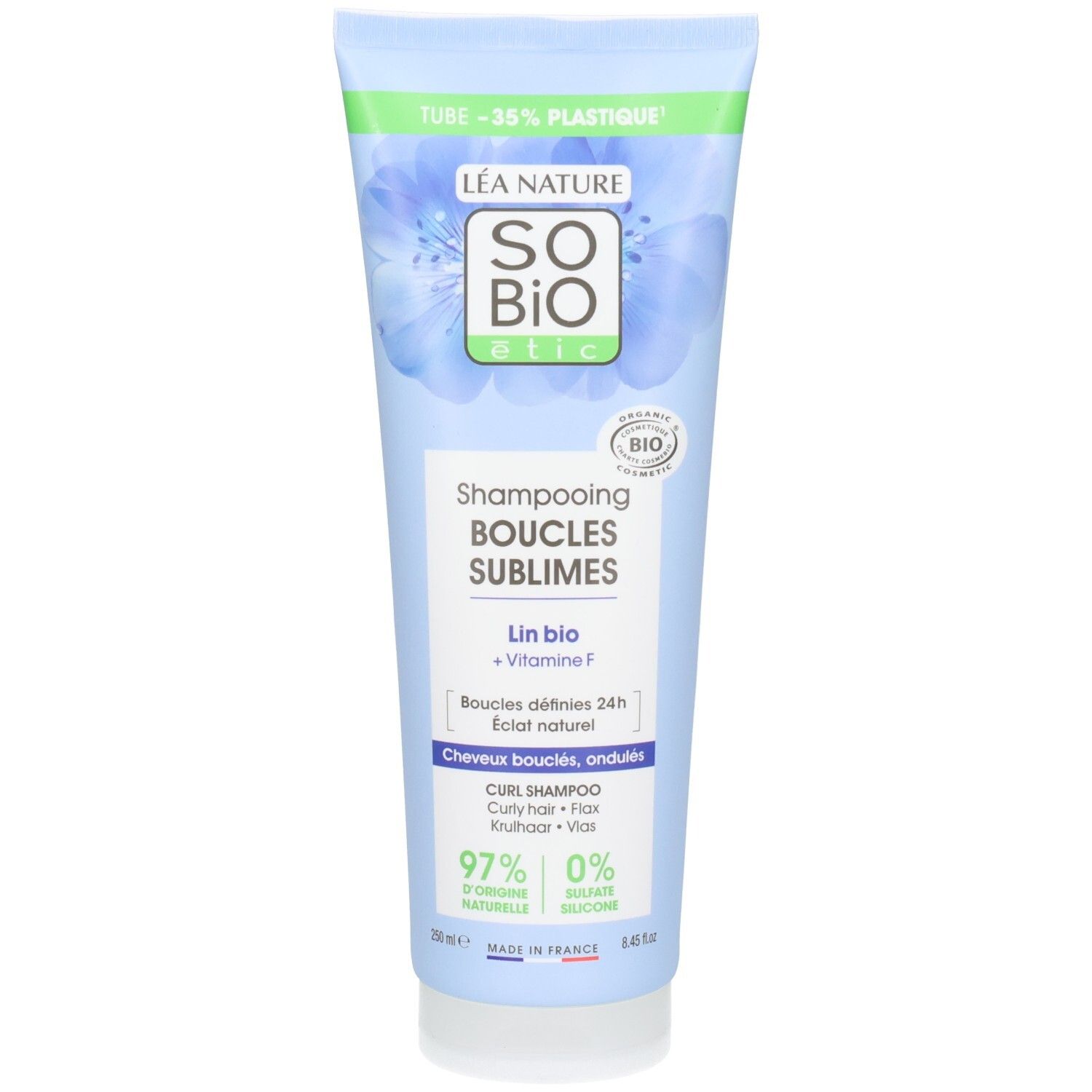 Tube bleu clair de shampooing "So Bio Etic". Inscription "Shampooing Boucles Sublimes". Logos et texte verts et blancs.