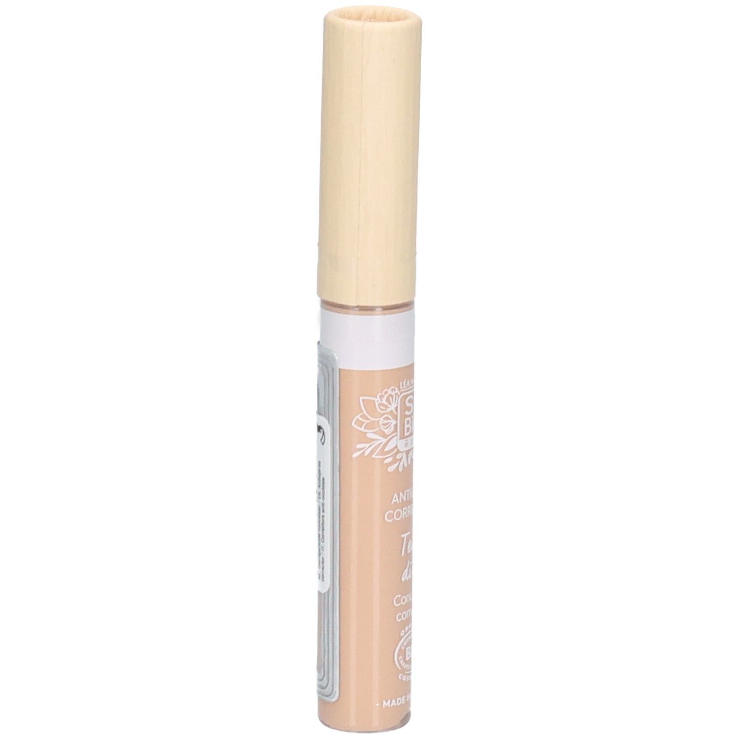 Correcteur beige avec bouchon clair. Inscriptions: SO BIO, Anticerne Correcteur, Teint divin, Concealer corrector.