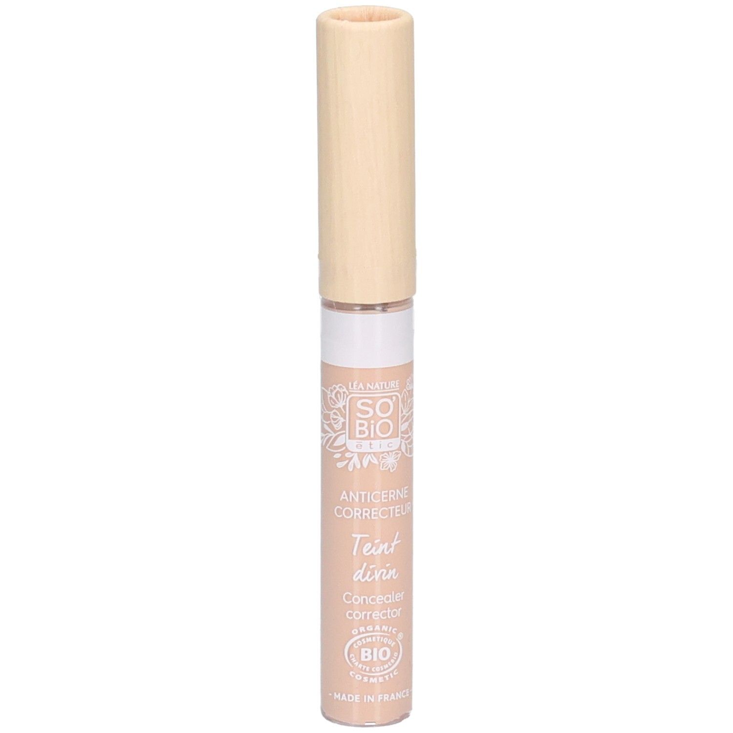 Correcteur de teint avec bouchon beige. Inscription: SO BIO, Anticerne Correcteur, Teint divin, Concealer correcteur. Certification bio.