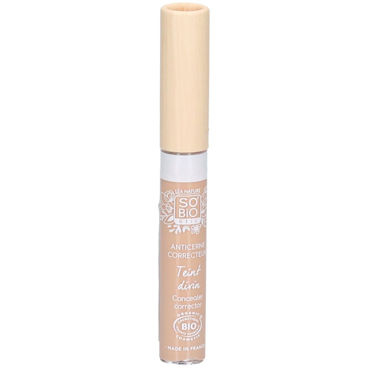 Correcteur beige avec bouchon clair. Inscriptions: SO BIO, Anticerne Correcteur, Teint divin, Concealer correcteur. Certification Bio.