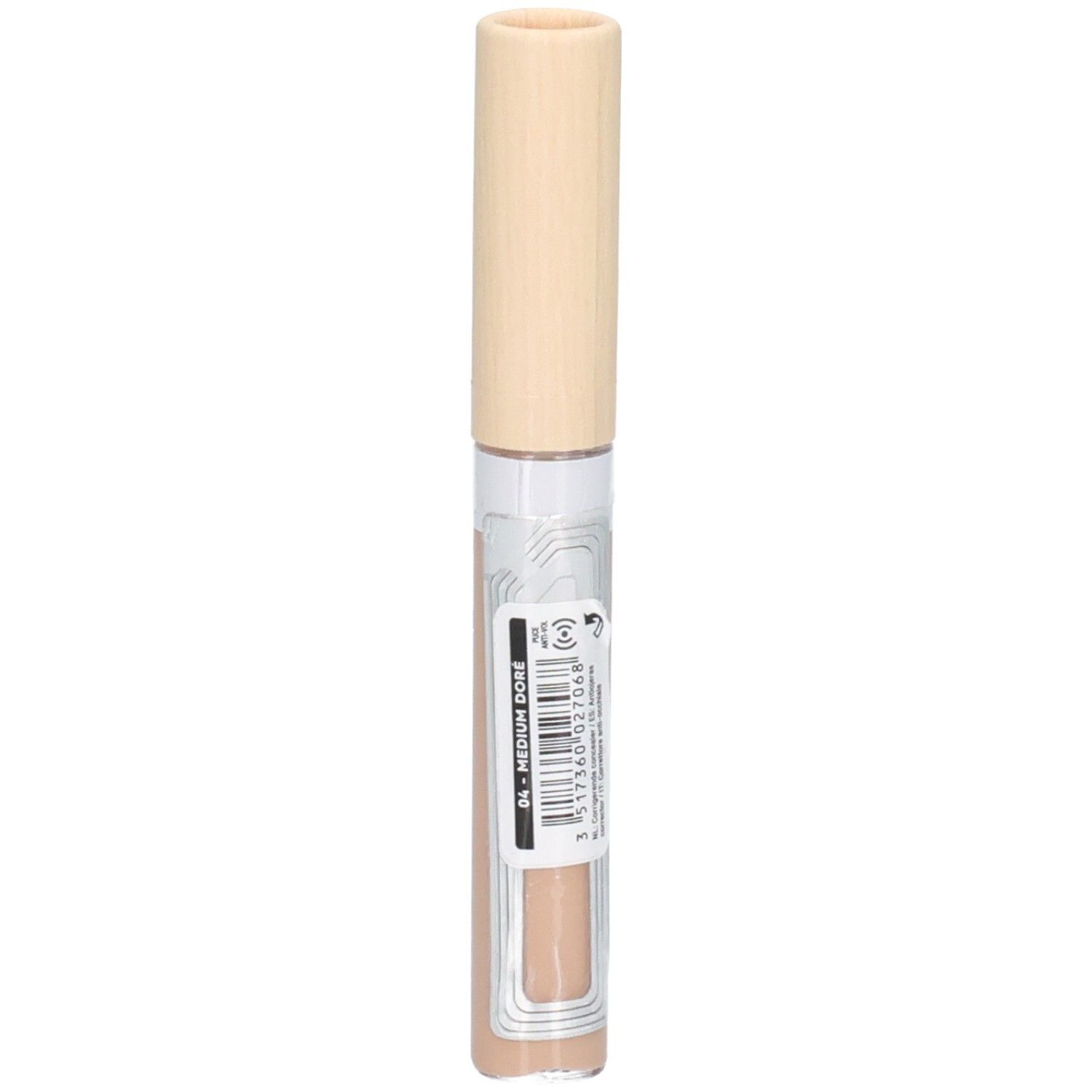 Correcteur beige avec bouchon clair. Étiquette avec informations produit. Inscription: 04 - MEDIUM DORÉ.