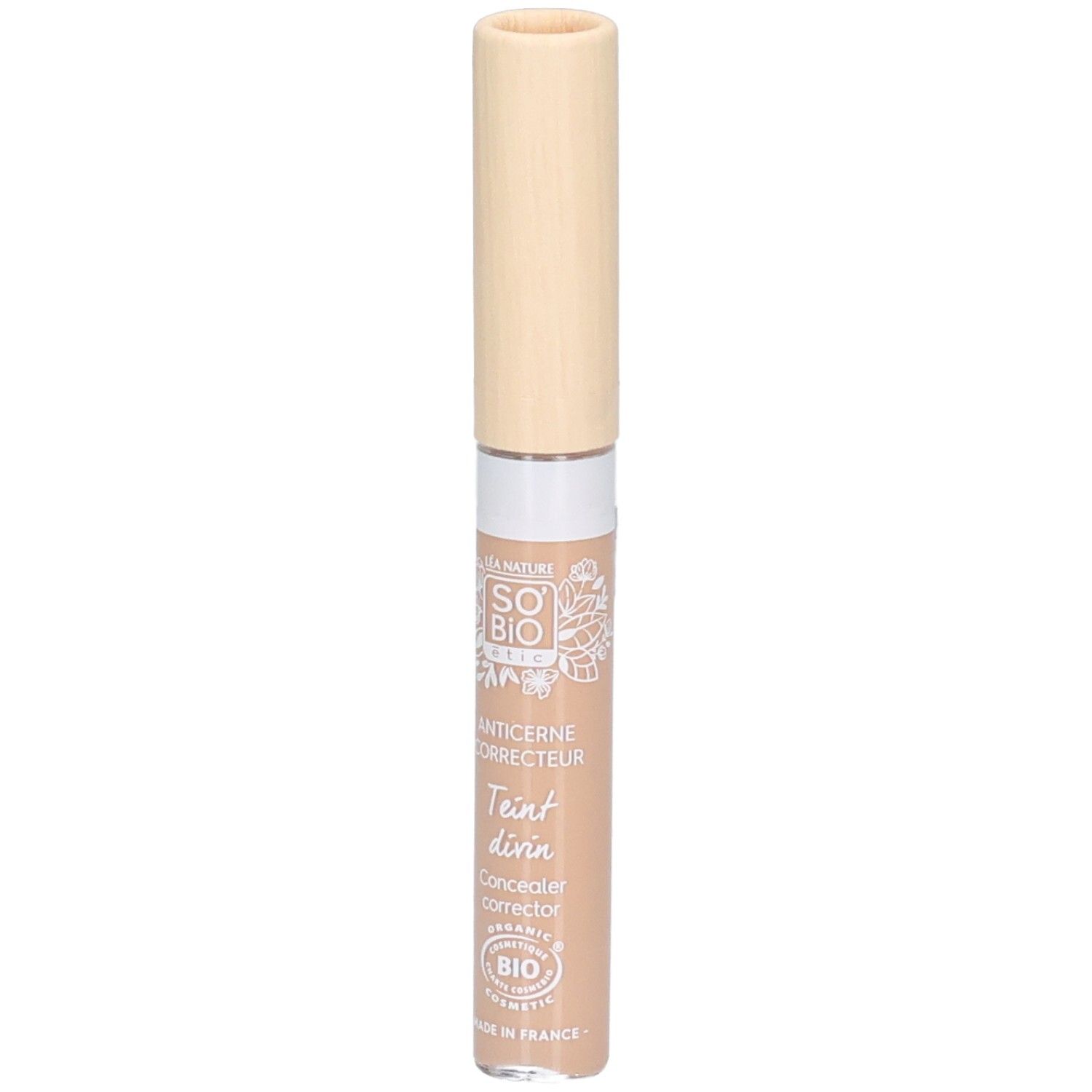 Correcteur beige avec bouchon clair. Inscriptions: SO BIO, Anticerne Correcteur, Teint divin, Concealer correcteur. Certification Bio.