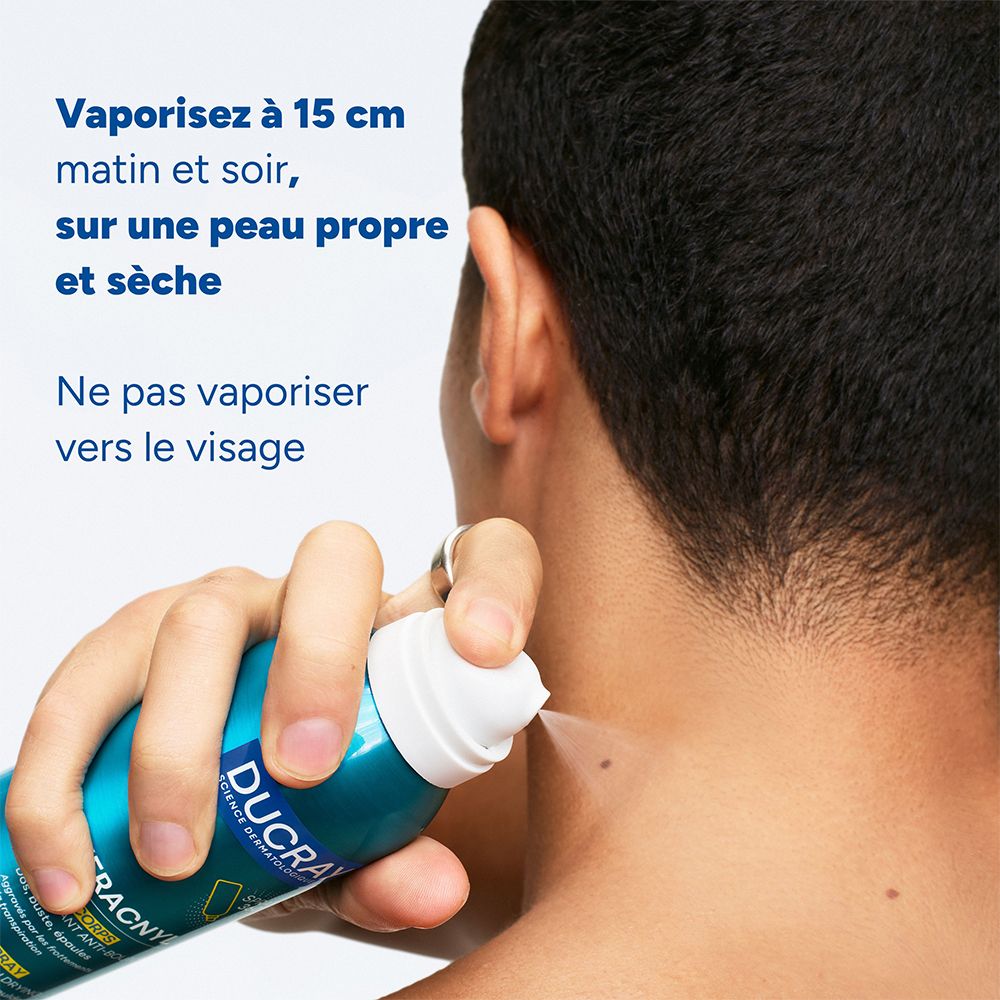 Trois flacons de Ducray Keracnyl Spray Corps. Contient 7% d'acides.