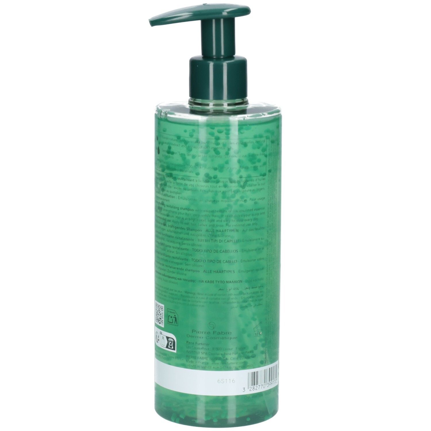 Arrière d'un flacon de shampooing vert avec étiquette et code QR.