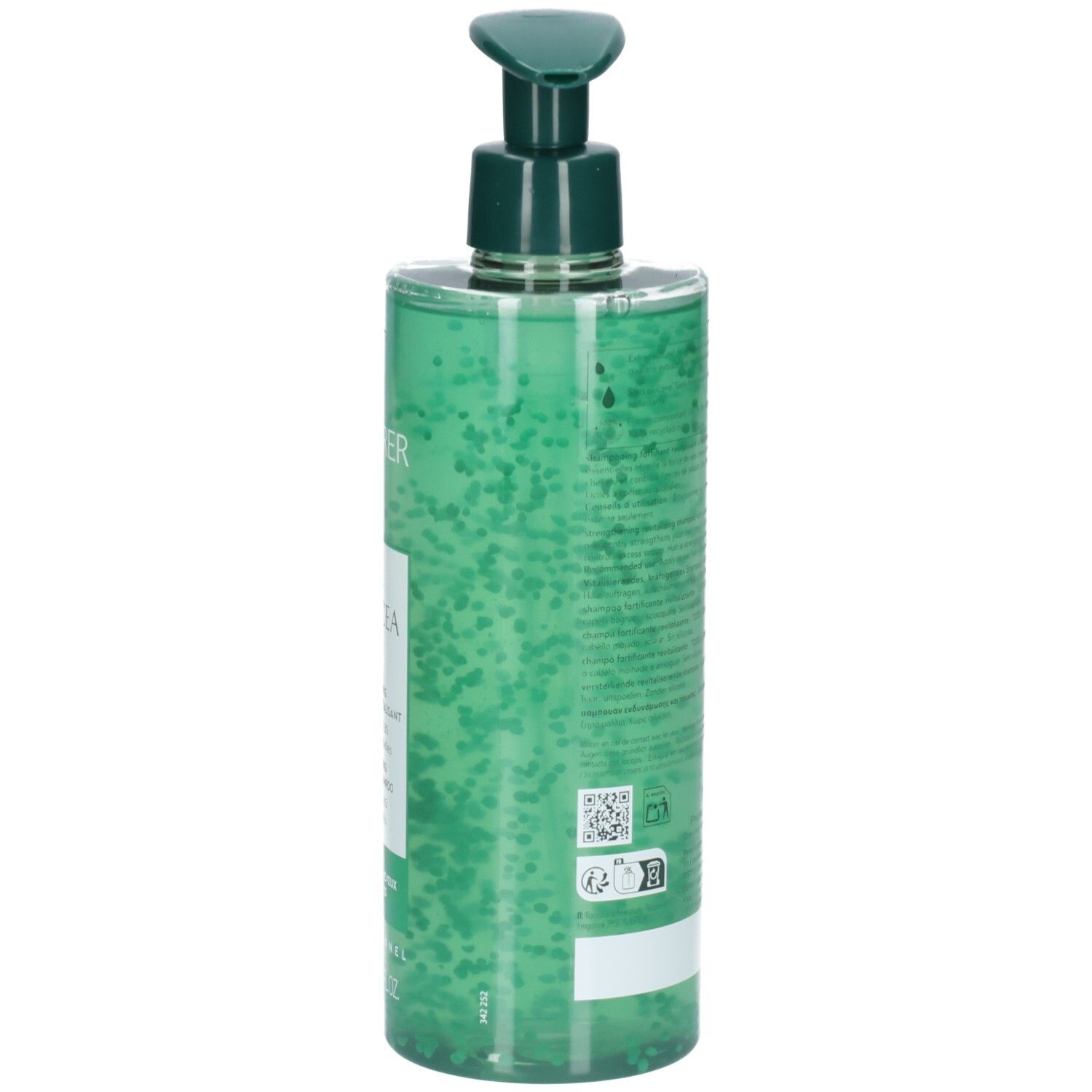 Arrière d'un flacon de shampooing vert avec étiquette et code QR.