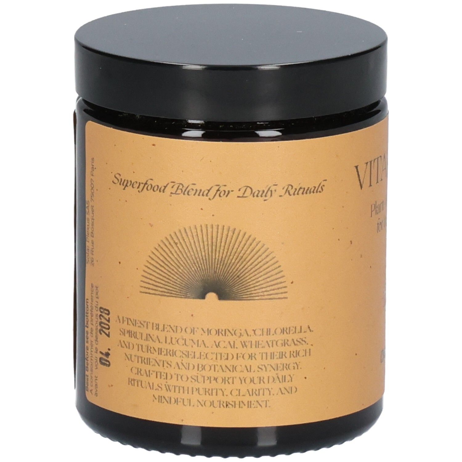 Pot marron avec couvercle noir. Inscription: Superfood Blend for Daily Rituals. Liste des ingrédients.
