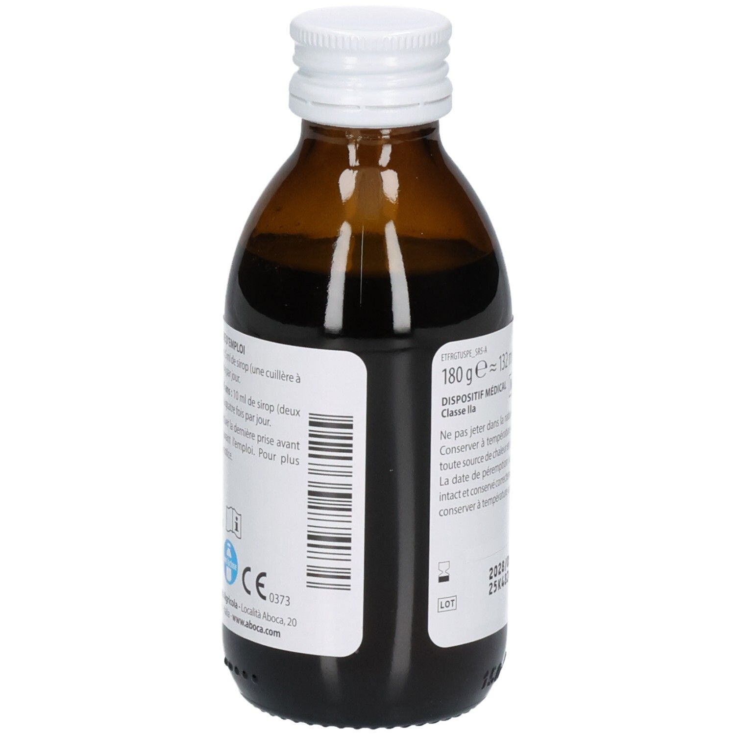 Arrière d'une bouteille en verre brun avec sirop. Étiquette avec marquage CE, code-barres et informations fabricant.