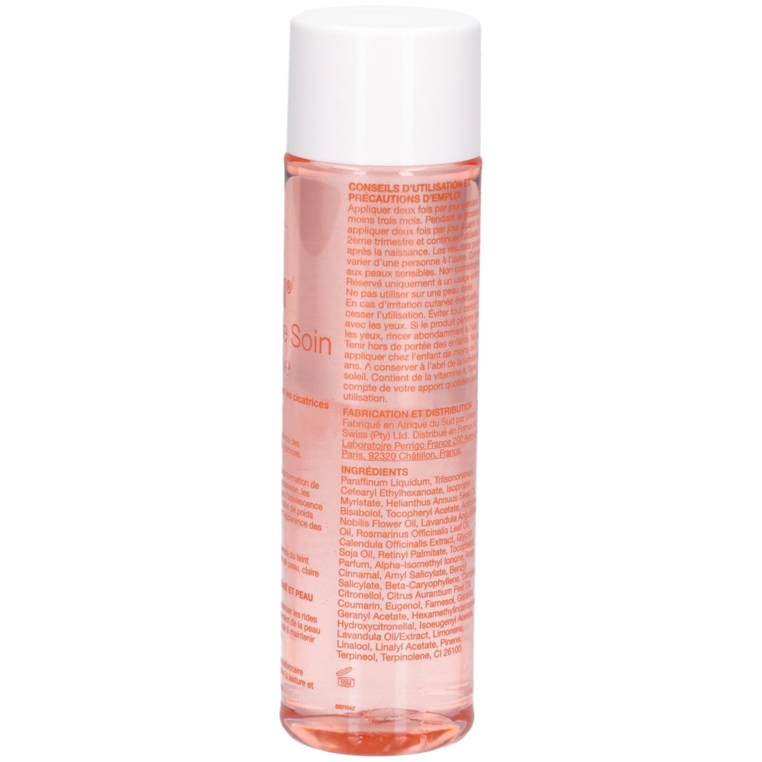 Flacon cylindrique, bouchon blanc. Liquide rose. Texte en rouge sur le flacon.