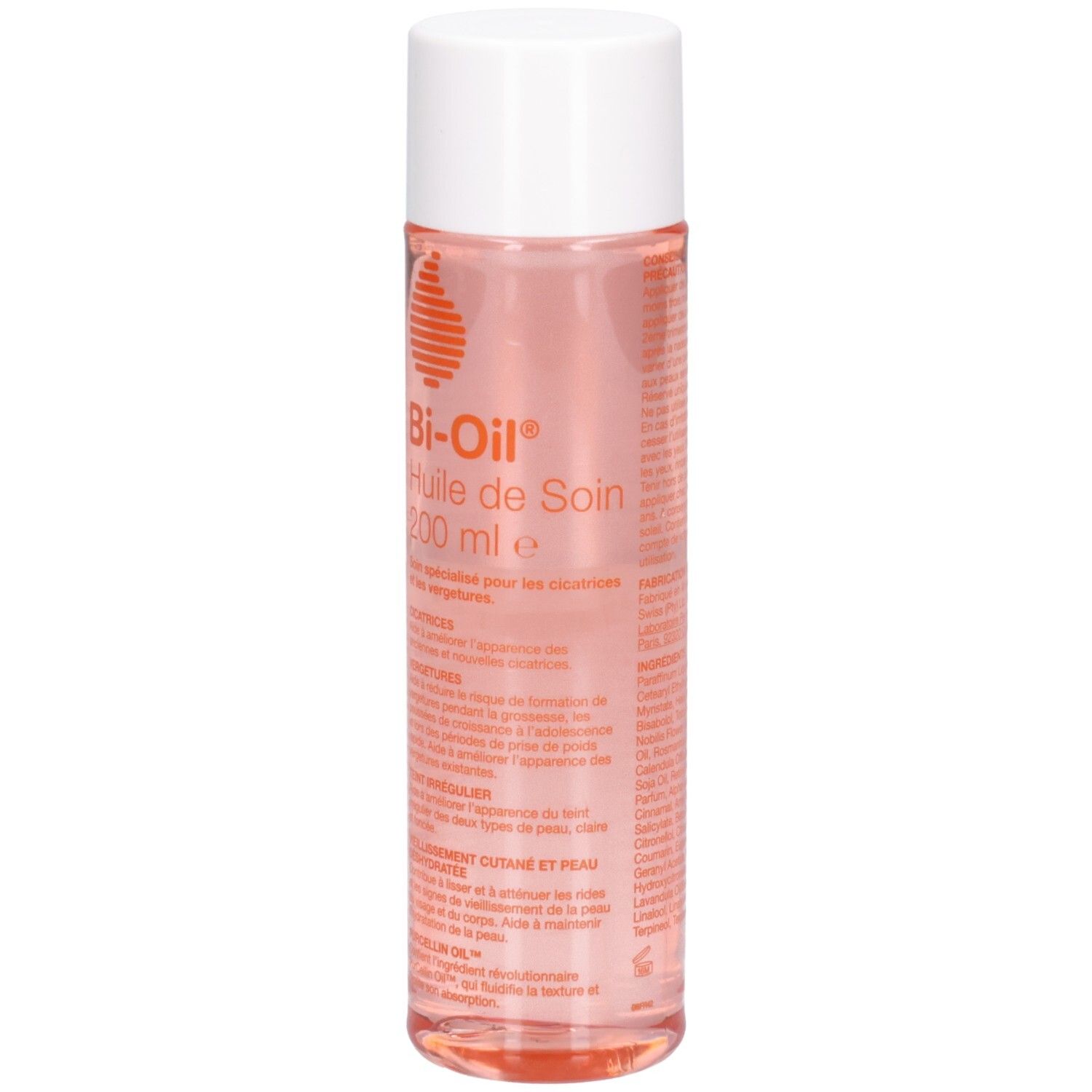 Flacon cylindrique, bouchon blanc. Inscription: Bi-Oil Huile de Soin 200 ml. Liquide rose visible.