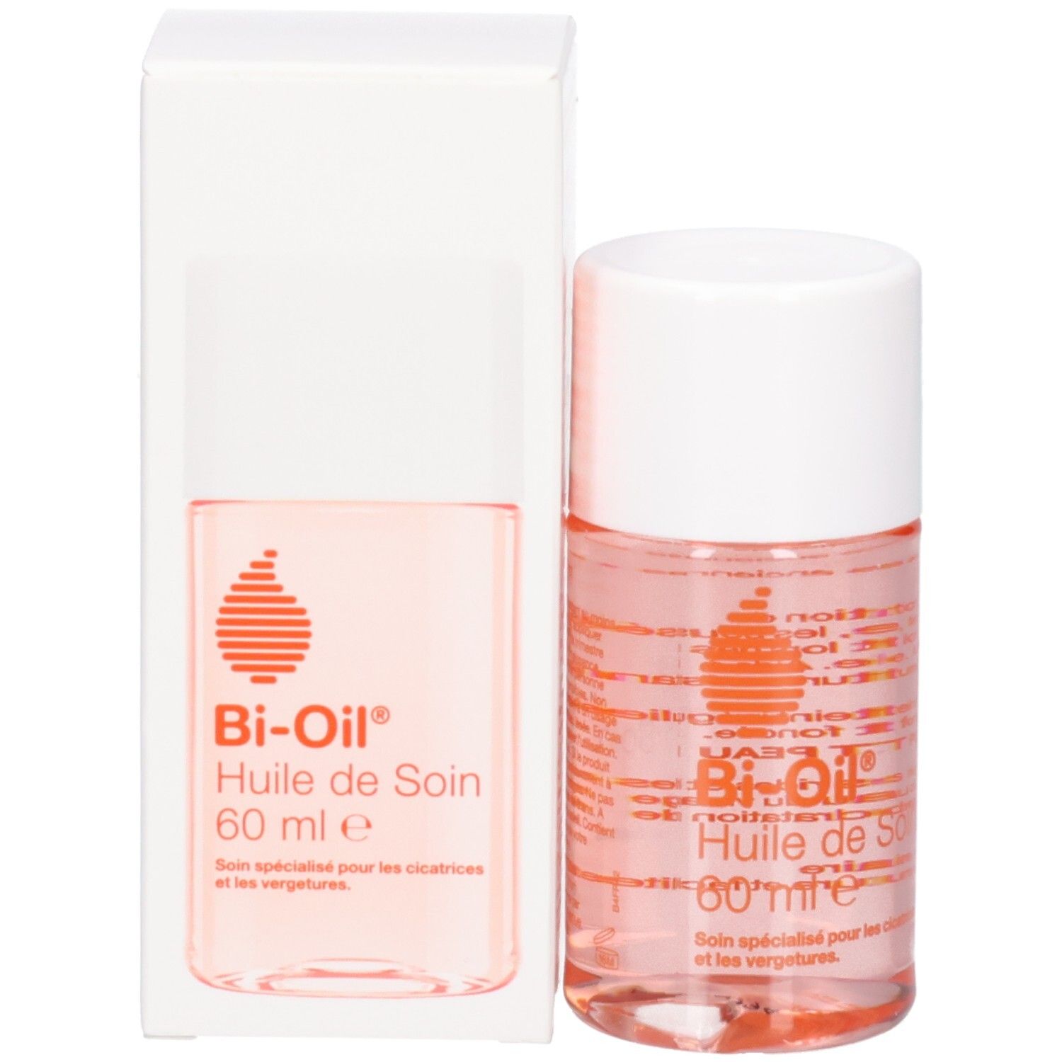 Produit et emballage. Flacon et boîte. Inscription: Bi-Oil Huile de Soin. Liquide rose visible.