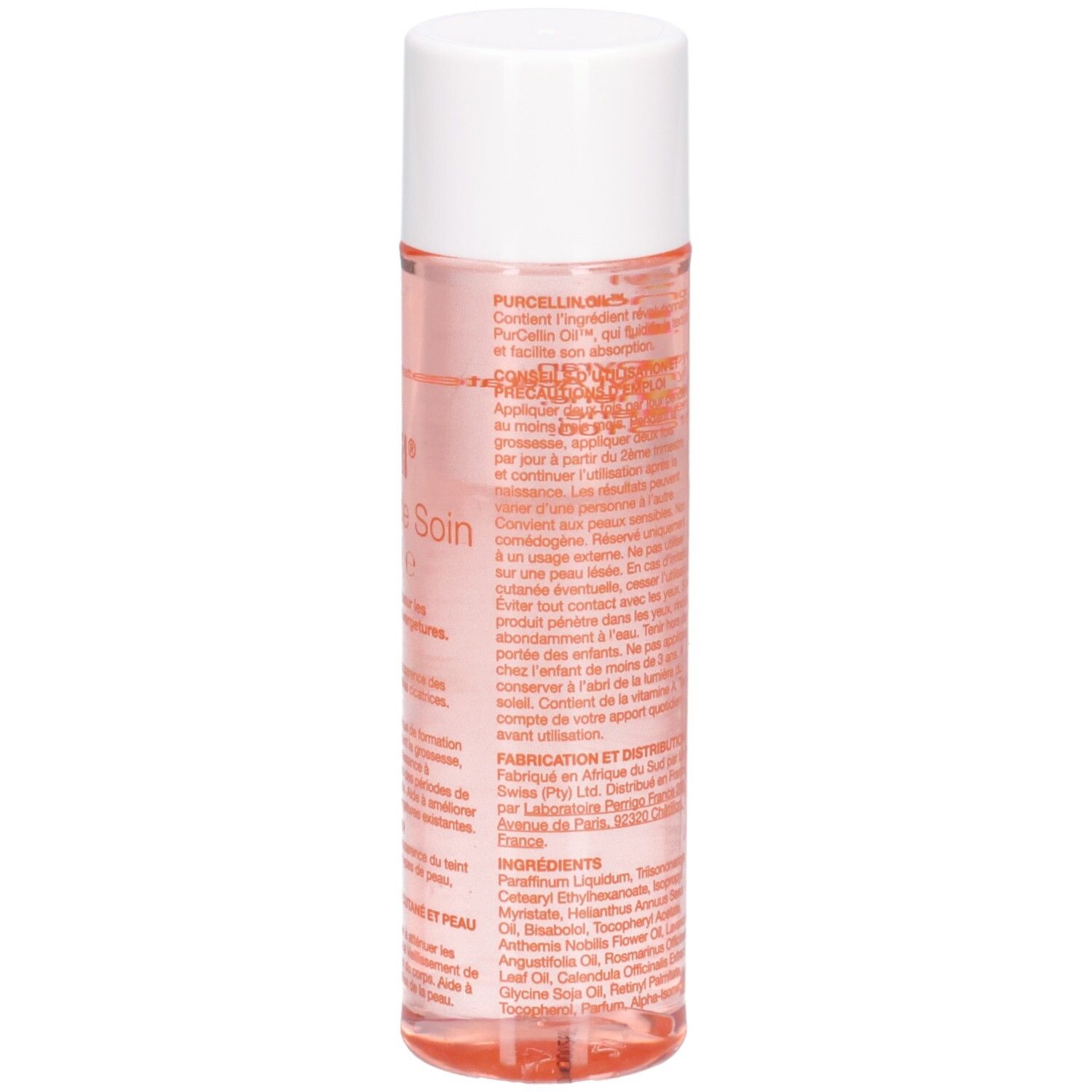 Flacon cylindrique, bouchon blanc. Liquide rose visible. Étiquette avec texte en rouge. Nom du produit et informations.
