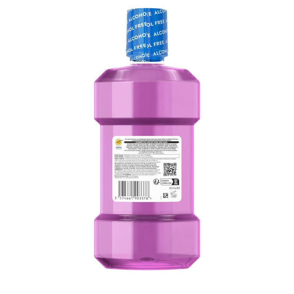 Arrière d'une bouteille de bain de bouche Listerine Total Care avec ingrédients et code-barres.