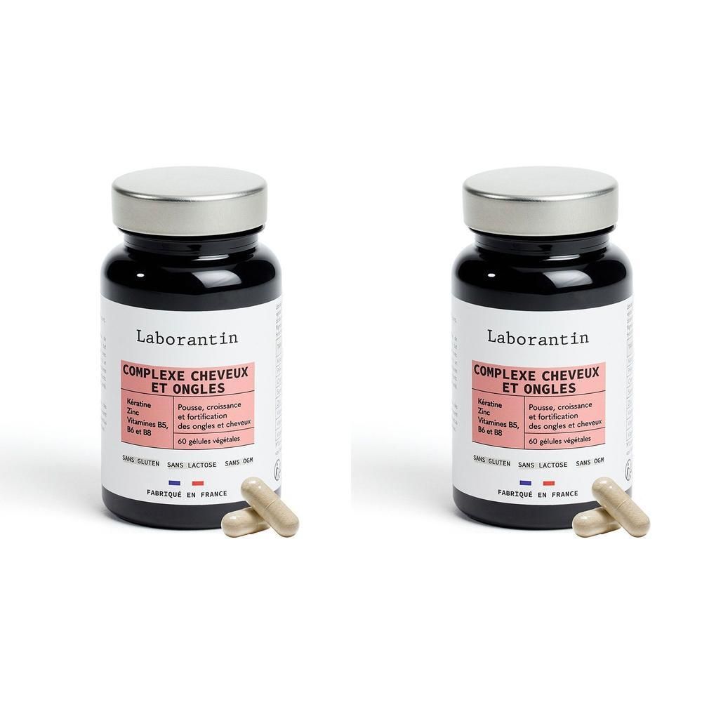 Deux flacons de gélules. Inscription: Laborantin Complexe Cheveux et Ongles. Gélules à côté.