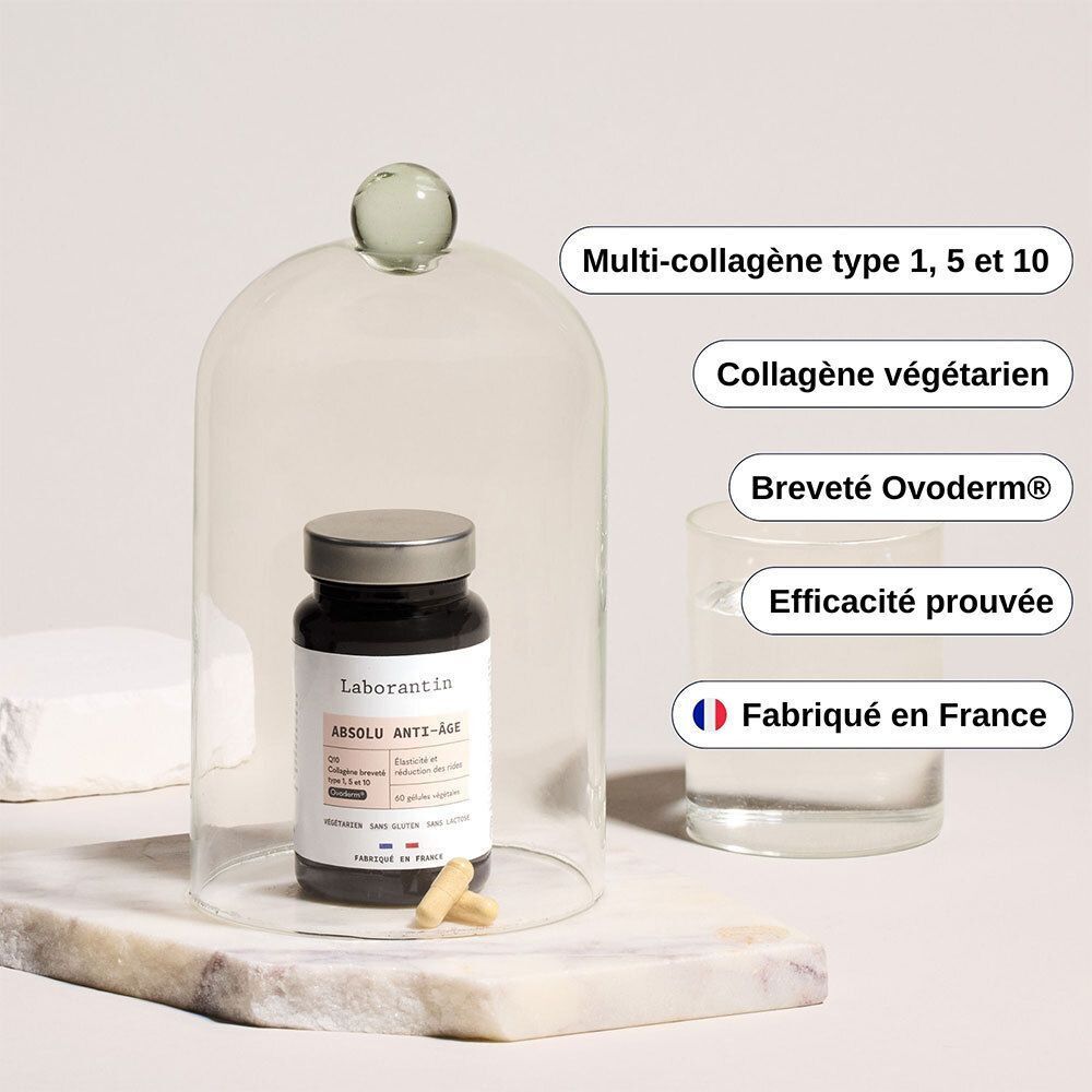 Flacon Laborantin Absolu Anti-Âge sous cloche. Texte: Multi-collagène type 1, 5 et 10, Breveté Ovoderm®.