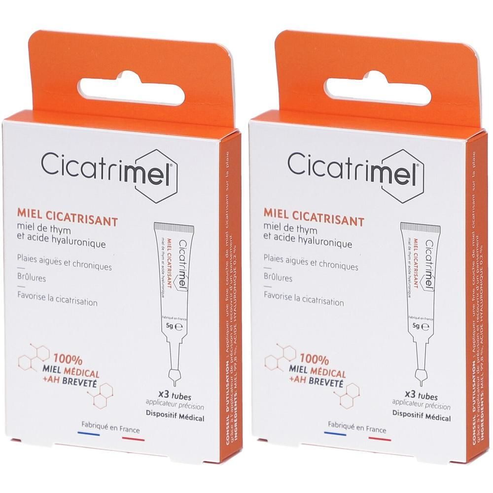 Deux boîtes "Cicatrimel". Inscription "MIEL CICATRISANT". Contient 3 tubes. Dispositif médical. Emballage orange et blanc.