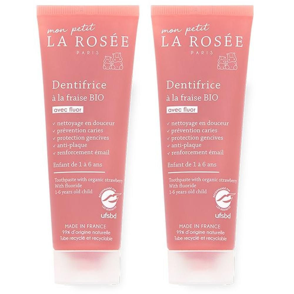 Deux tubes de dentifrice rose avec bouchon blanc. Inscription "mon petit LA ROSÉE". Texte : "Dentifrice à la fraise BIO".