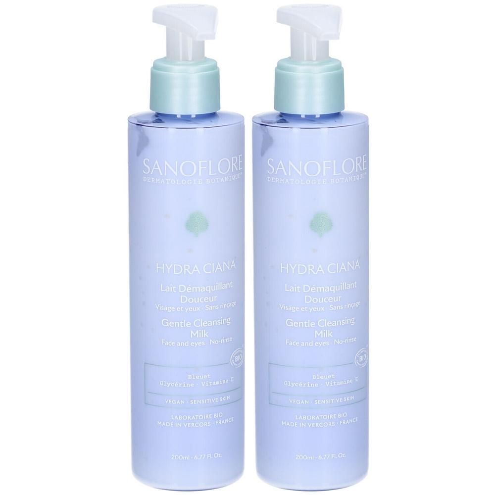 Deux flacons avec pompe. Inscription: SANOFLORE, HYDRA CIANA, Gentle Cleansing Milk. Pour peaux sensibles. Vegan. Laboratoire en France.