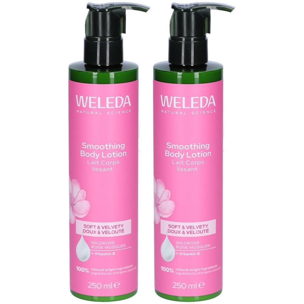 Deux flacons de lotion pour le corps avec pompe. Étiquette rose avec texte blanc. Marque : WELEDA. Texte : Smoothing Body Lotion, 250 ml.