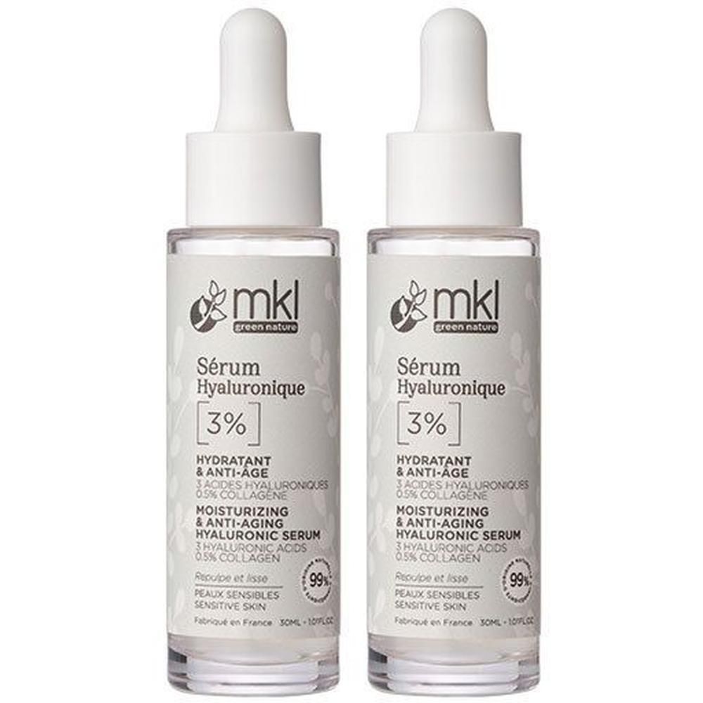 Deux flacons de Sérum Hyaluronique MKL Green Nature. Flacons blancs avec compte-gouttes. Inscription : Sérum Hyaluronique 3%.