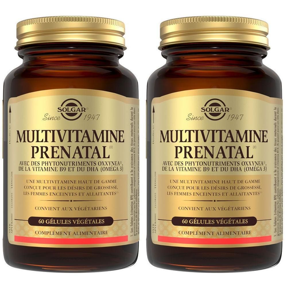 Deux flacons de Solgar Multivitamine Prenatal. Flacons en verre brun avec couvercles dorés et étiquettes. Inscription : Multivitamine Prenatal.