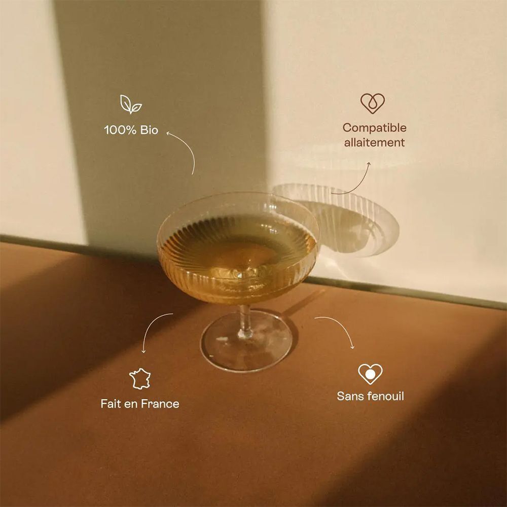 Verre contenant une boisson, avec texte: "100% Bio", "Compatible allaitement", "Fabriqué en France", "Sans fenouil".