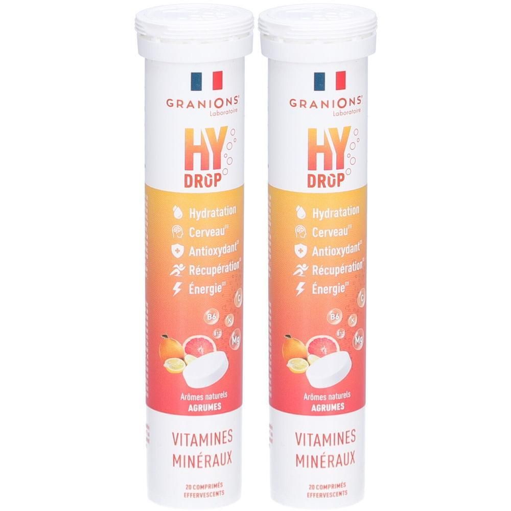 Deux tubes blancs avec couvercles. Inscription: GRANIONS, HY DROP, Vitamines Minéraux. Illustration de fruits.