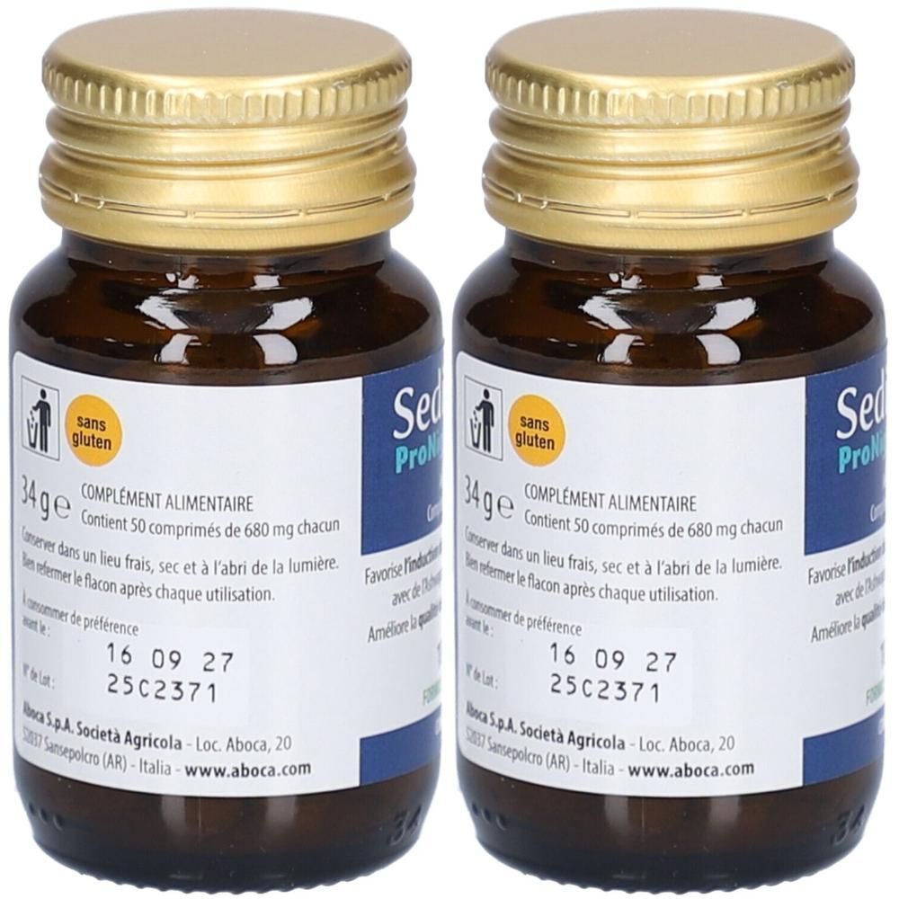 Deux flacons en verre brun avec des couvercles dorés. Étiquettes avec texte et symboles, dont "Sedivitax Pronight".