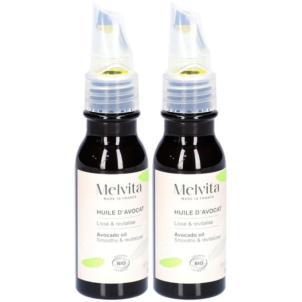 Deux flacons d'huile d'avocat avec applicateur. Inscription : Melvita, Huile d'Avocat, BIO.