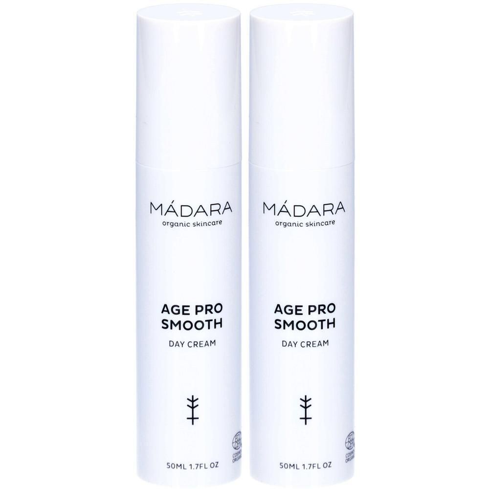 Deux flacons blancs avec texte. Marque: MÁDARA, Age Pro Smooth Day Cream. En bas: 50ML 1.7FL OZ. Logo de certification.