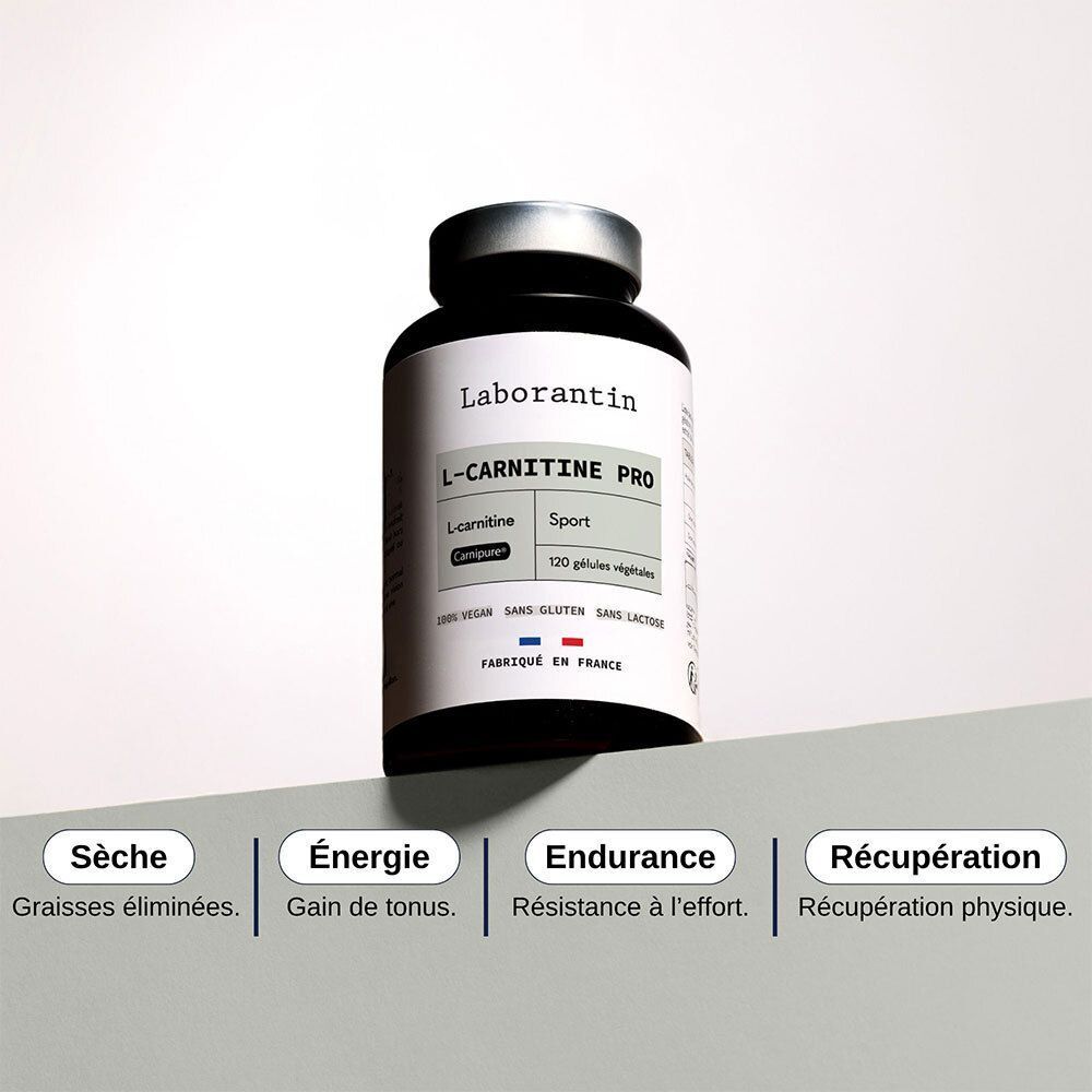 Un flacon Laborantin L-Carnitine Pro. Flacon noir avec étiquette blanche. Quatre zones de texte avec des mots-clés.