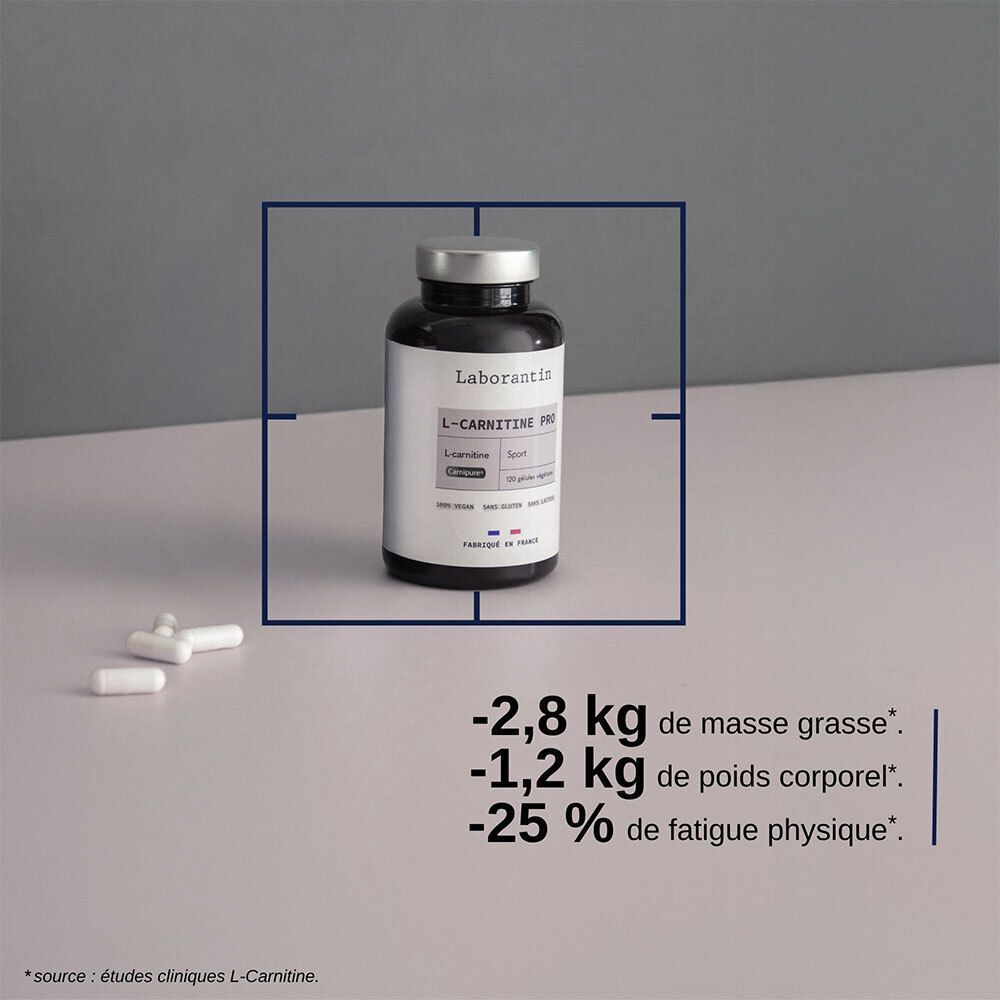 Un flacon Laborantin L-Carnitine Pro. Flacon noir avec étiquette blanche. Texte avec informations sur la perte de graisse et de poids.