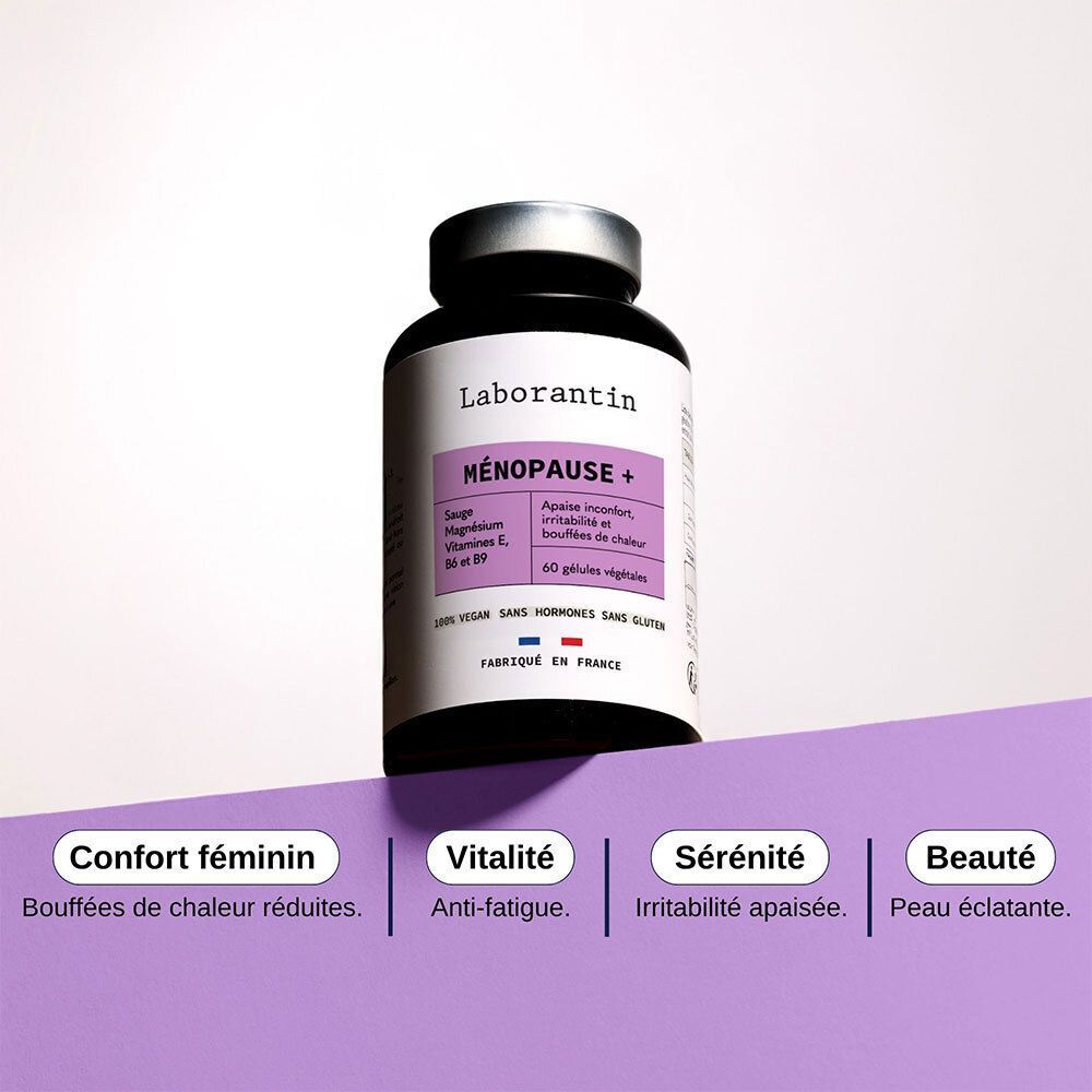 Un flacon noir avec couvercle argenté. Étiquette "Laborantin Ménopause +". Quatre encadrés colorés : Confort, Vitalité, Sérénité, Beauté.