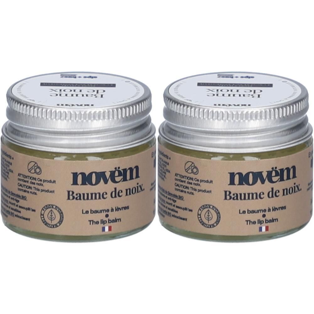 Deux pots de baume à lèvres avec couvercles argentés. Les étiquettes indiquent "novèm Baume de noix" et "The lip balm".
