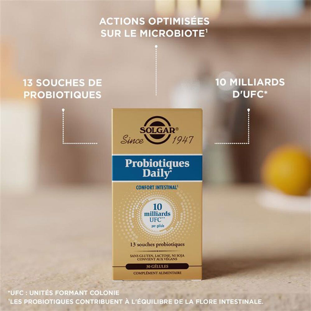 Boîte SOLGAR Probiotiques Daily. Boîte dorée avec texte bleu. 10 milliards d'UFC. 13 souches bactériennes. Sur fond clair.