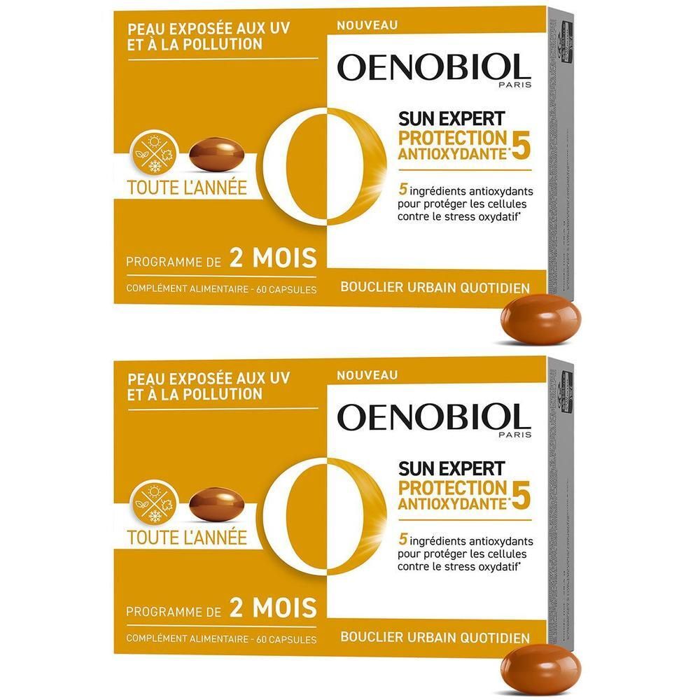 Deux boîtes de OENOBIOL Sun Expert Protection Antioxydante 5. Chaque boîte contient 60 gélules. Gélule marron à côté de l'emballage.